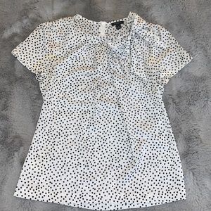 Polka dot silky dress top with a bow